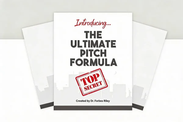 Forbes Riley coaching professionals during Pitch Like A Pro presentation workshop